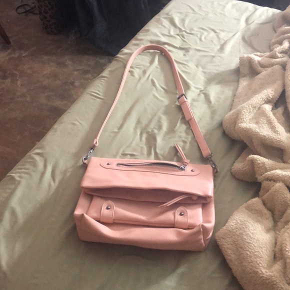 This is a pink kind of coral vans bag - Picture 3 of 6